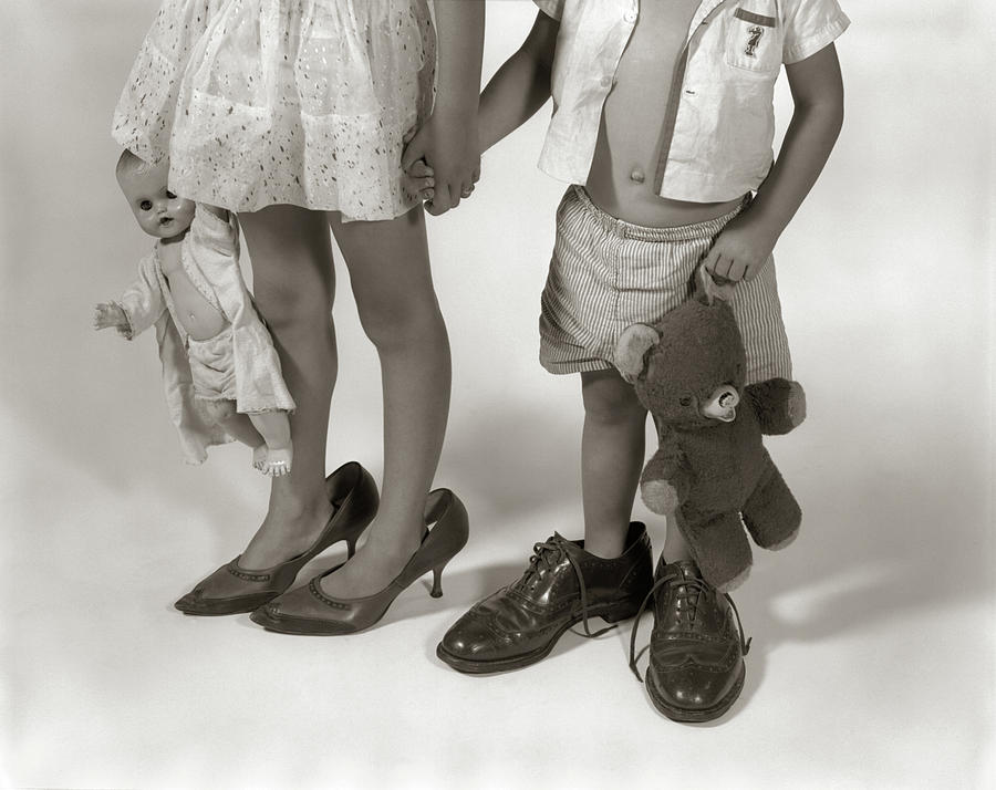 1950s 1960s Close-up Of Little Girl & Photograph By Vintage Images