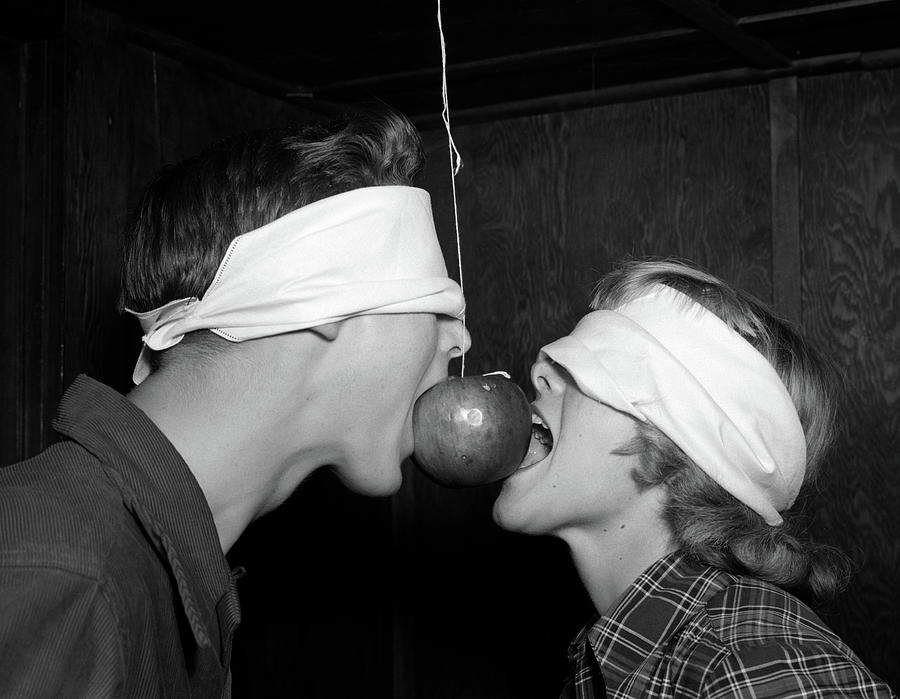 Black And White Photograph - 1950s Blindfolded Teenage Couple Boy by Vintage Images