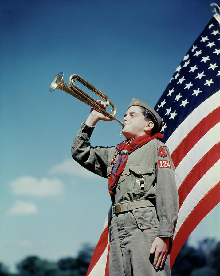1950s Boy Scout Blowing Bugle In Front Photograph by Vintage