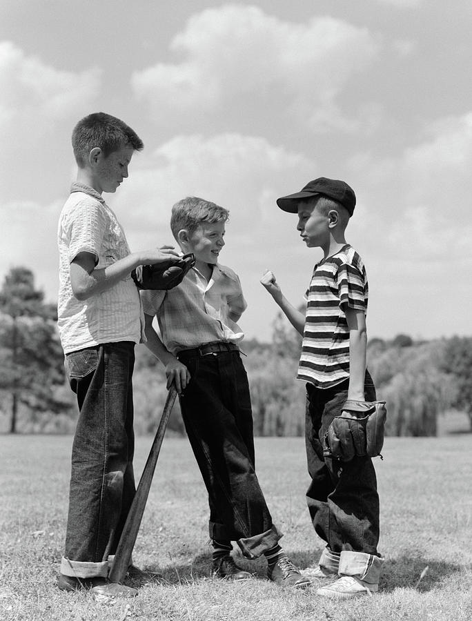 Black And White Photograph - 1950s Boys Baseball Threesome One by Vintage Images