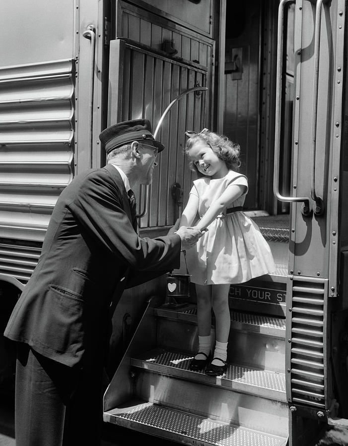 1950s Conductor Greeting Little Girl Photograph by Vintage Images