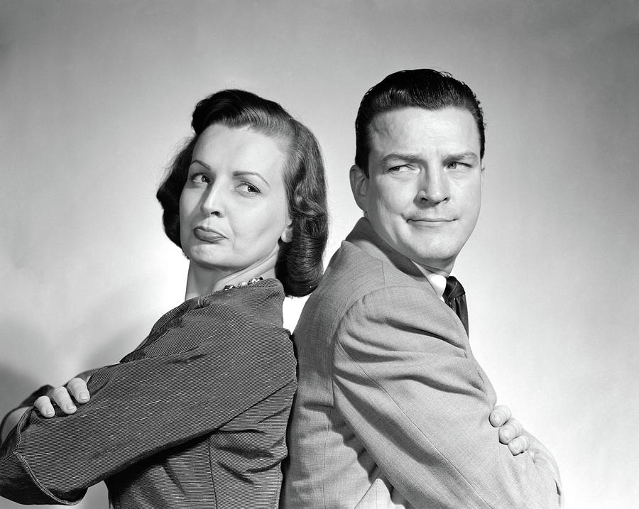 1950s Couple Sitting Back To Back Arms Photograph by Vintage Images ...