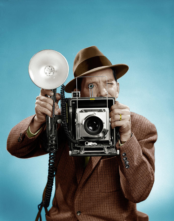 1950s Press Photographer Man Holding Photograph by Vintage Images ...