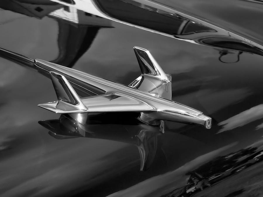 1955 Chevy Bel Air Hood Ornament in Black and White Photograph by Kathy K McClellan