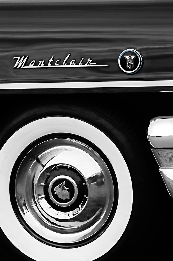 1955 Mercury Montclair Convertible Wheel Emblem Photograph by Jill Reger