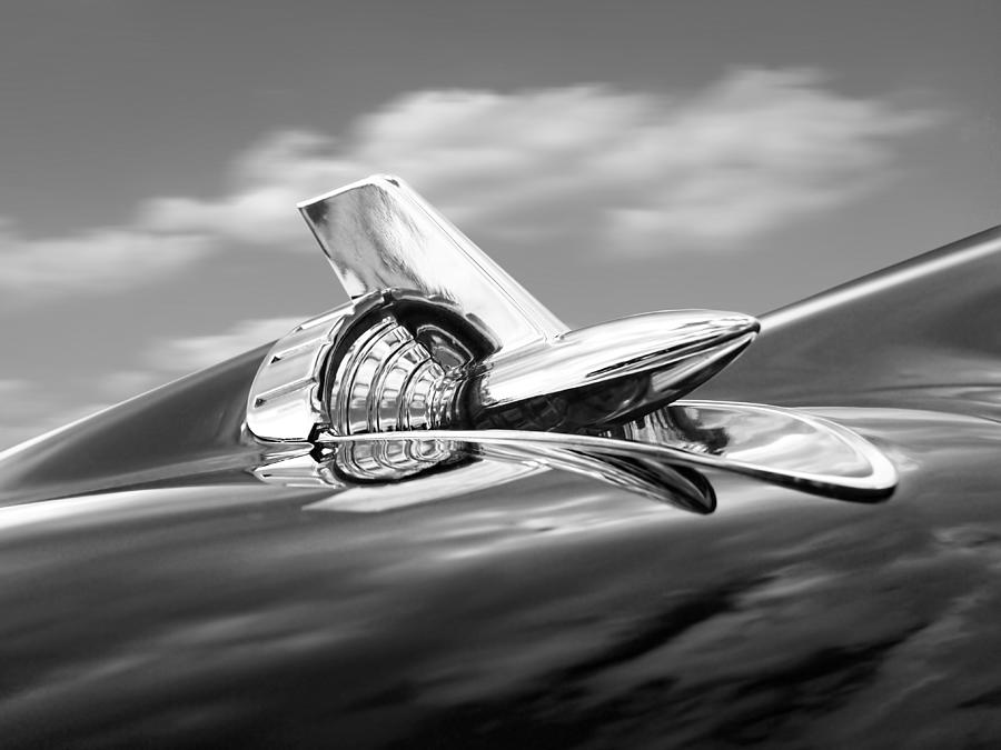 Abstract Photograph - 1957 Chevy Bel Air Hood Ornament in Black and White by Gill Billington