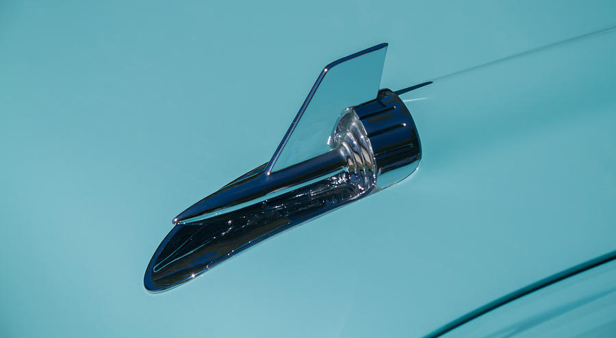 1957 Chevy Hood Ornament Photograph by Roger Mullenhour