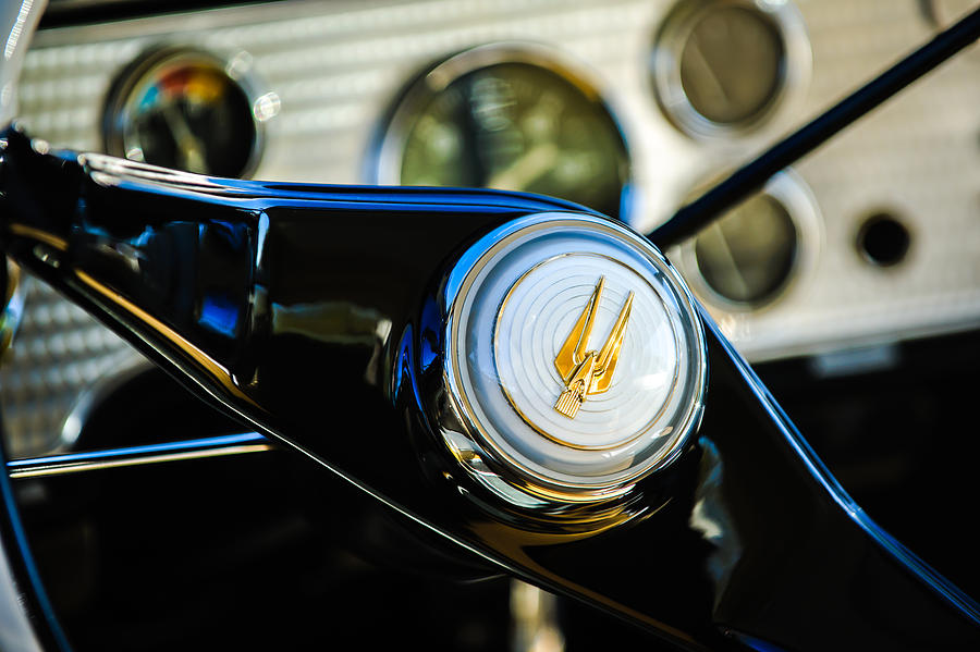Car Photograph - 1957 Studebaker Golden Hawk Supercharged Sports Coupe Steering Wheel Emblem by Jill Reger