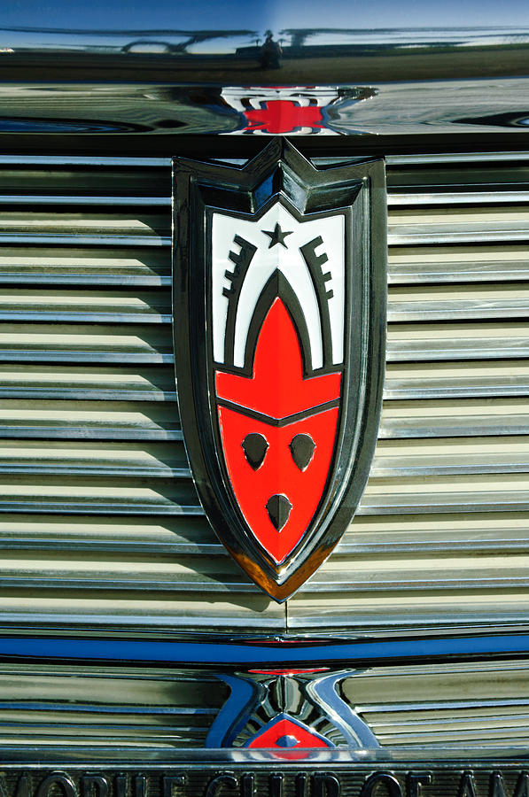 1958 Oldsmobile Emblem Photograph by Jill Reger