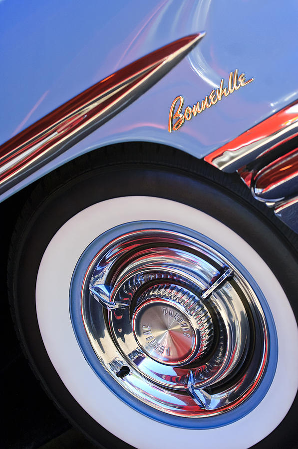 1958 Pontiac Bonneville Wheel Emblem Photograph by Jill Reger