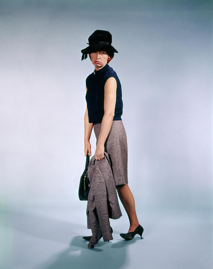 Hat Photograph - 1960s Exhausted Woman Walking Dragging by Vintage Images