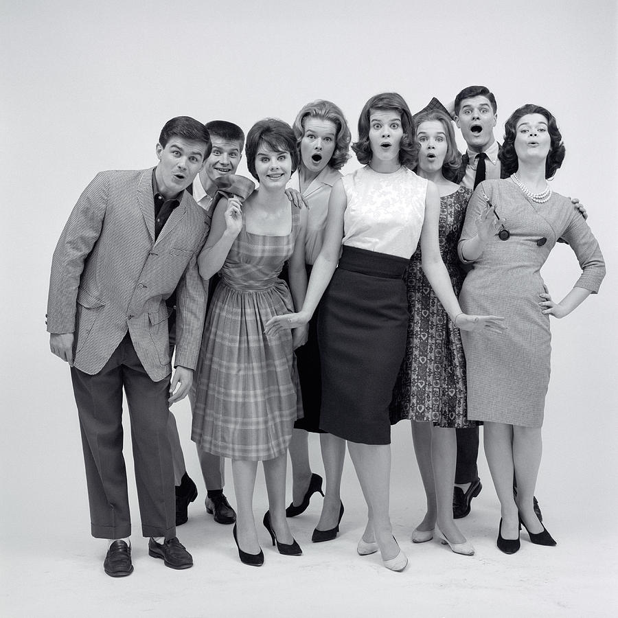 Black And White Photograph - 1960s Group Of 8 Fashionable Teens by Vintage Images