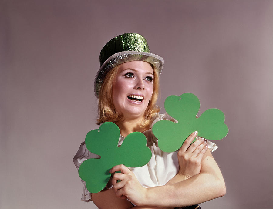 Vintage Photograph - 1960s Irish Woman Smiling Holding Green by Vintage Images