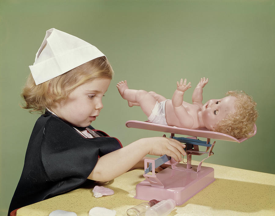 1960s Little Girl Dressed In Nurses Photograph by Vintage Images