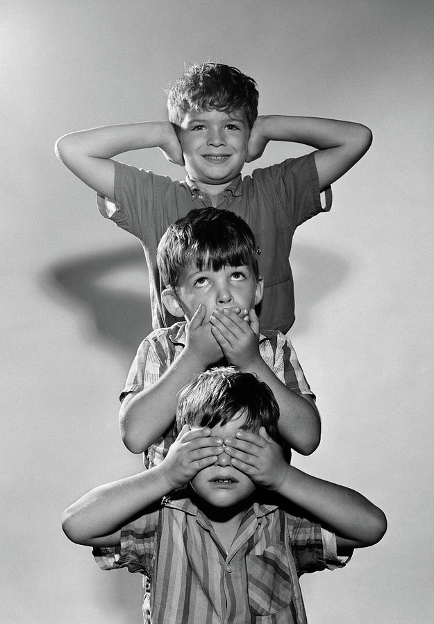Black And White Photograph - 1960s Portrait Of 3 Boys Miming Hear by Vintage Images