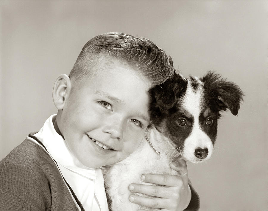 Horizontal Photograph - 1960s Portrait Of Smiling Boy Looking by Animal Images Horizontal Photograph - 1960s Portrait Of Smiling Boy Looking by Animal Images