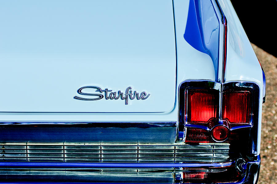 1963 Oldsmobile Starfire Taillight Emblem Photograph by Jill Reger