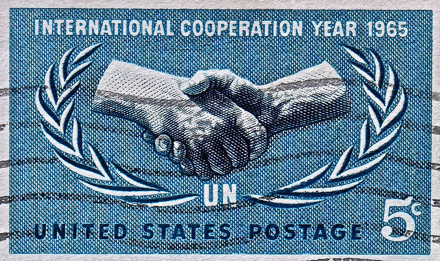 1965 International Cooperation Year Stamp Photograph by Bill Owen