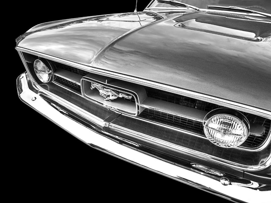 1967 Mustang Grille in Black and White Photograph by Gill Billington