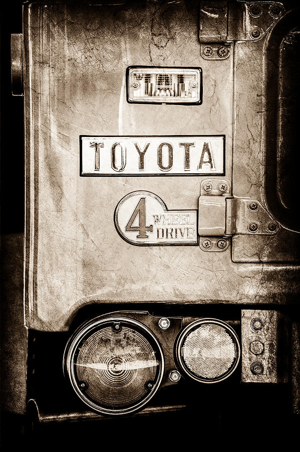 Transportation Photograph - 1969 Toyota FJ-40 Land Cruiser Taillight Emblem -0417s by Jill Reger