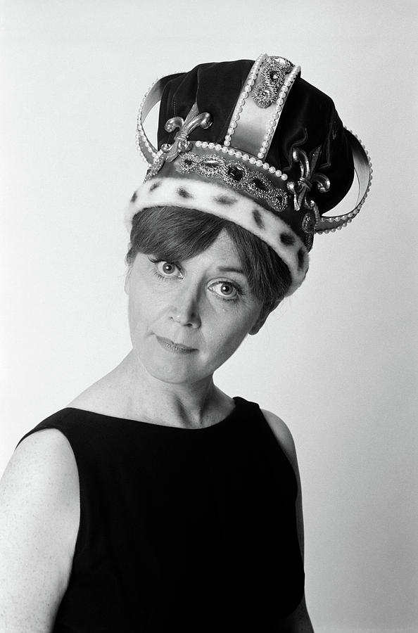 Black And White Photograph - 1970s Portrait Woman Wearing Queens by Vintage Images