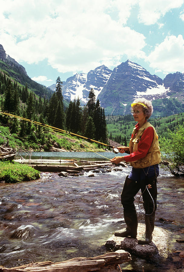 1990s Mature Woman Fly Fishing by Vintage Images
