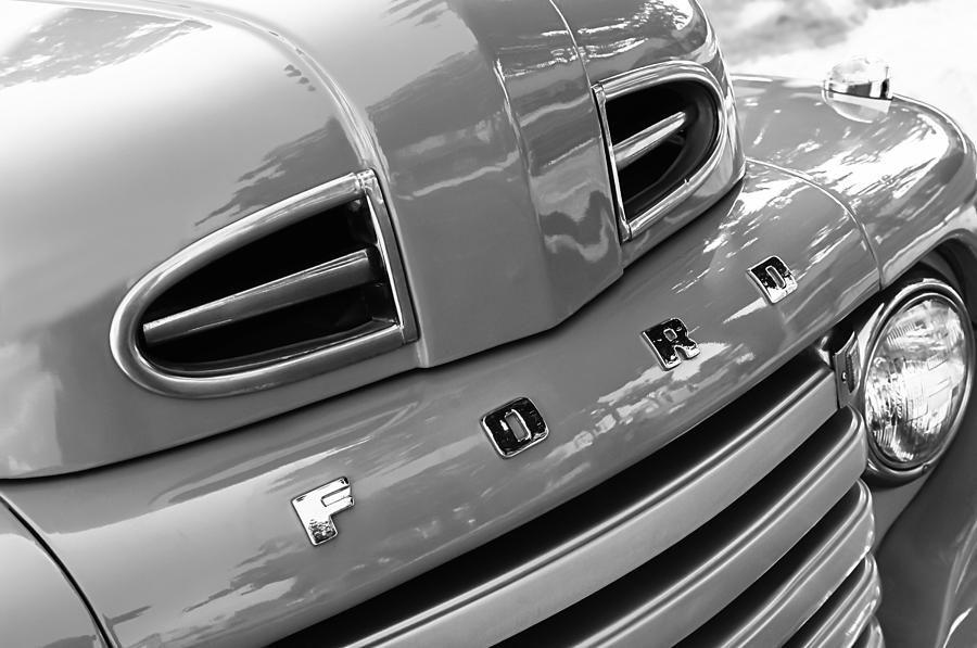 1949 Ford F-1 Pickup Truck Grille Emblem -0009BW Photograph by Jill Reger