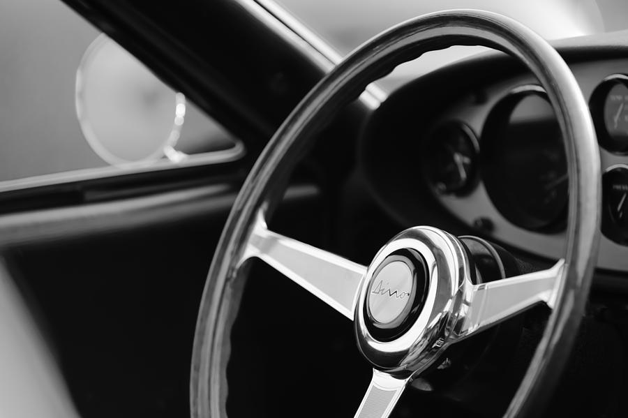 Black And White Photograph - 1971 Ferrari Dino 246 GT Steering Wheel Emblem #2 by Jill Reger