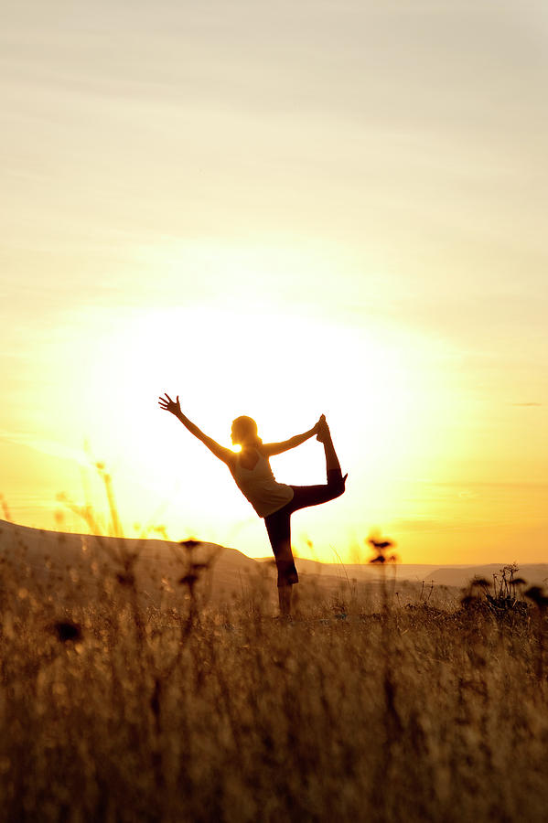 A Fit Woman Practicing Yoga Photograph By Jordan Siemens Fine Art America