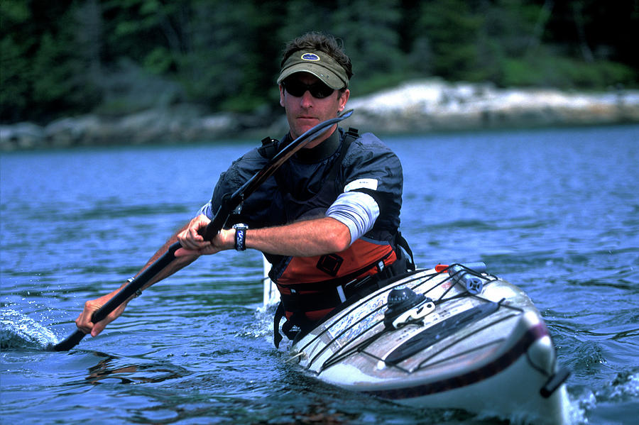 Sports Photograph - A Man Paddles His Sea Kayak Near Thief #2 by David McLain