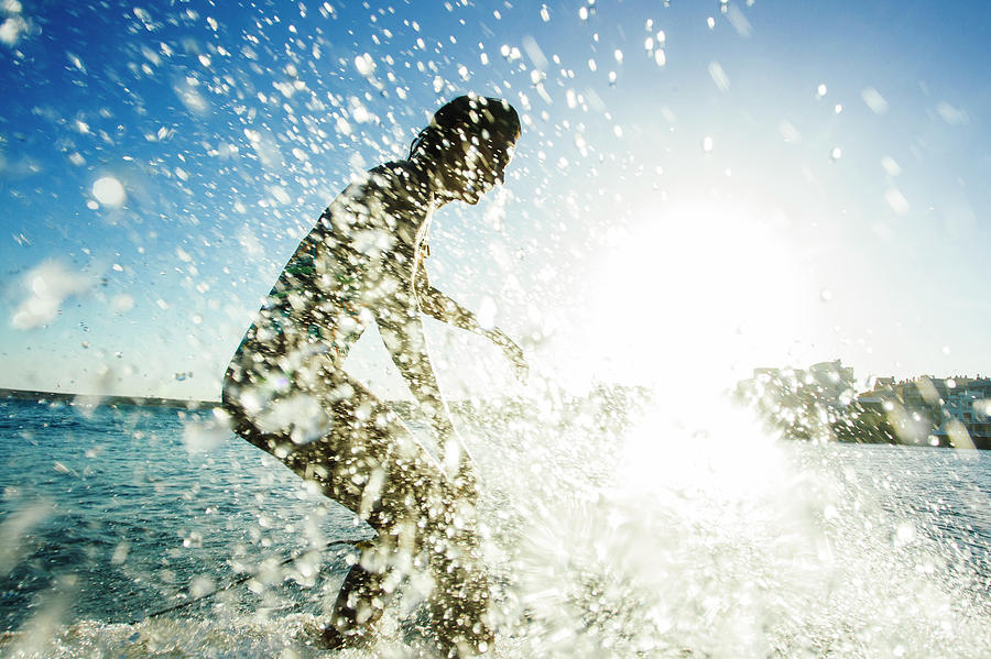 Nature Photograph - A Surfer Girl In A Bikini Surfs #2 by Sergio Villalba