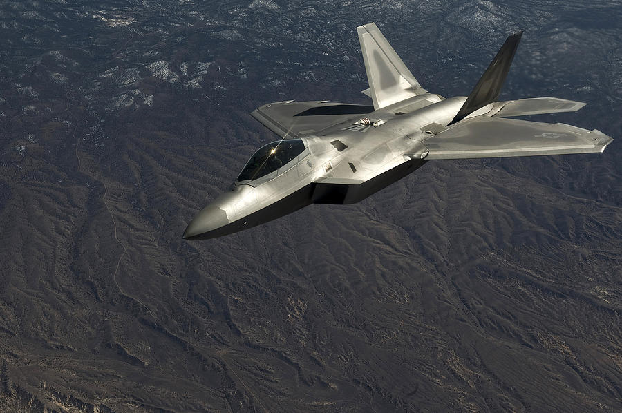 A U.S. Air Force F-22 Raptor in flight. #2 Photograph by Stocktrek Images