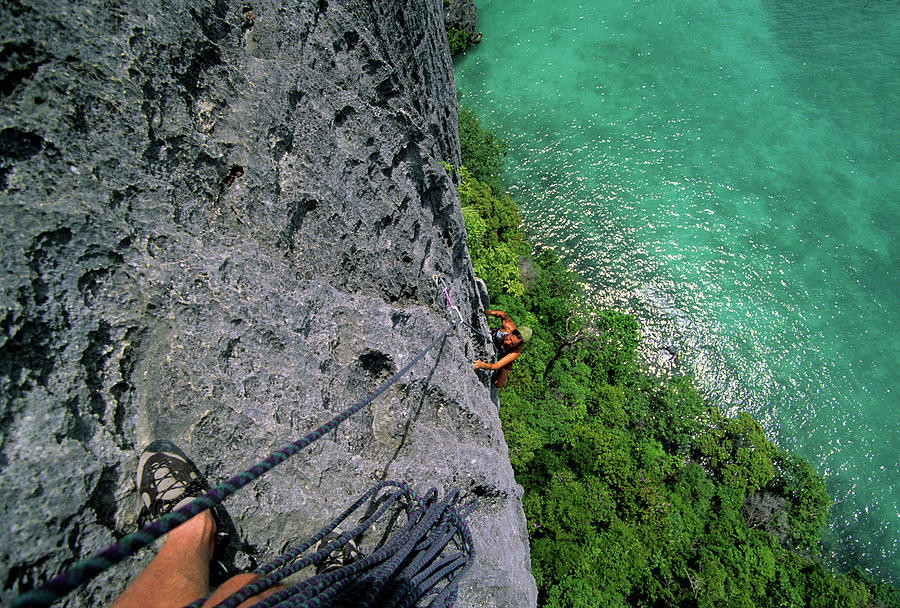 A Woman Climbs Above The Ocean Photograph by Bennett Barthelemy - Fine ...