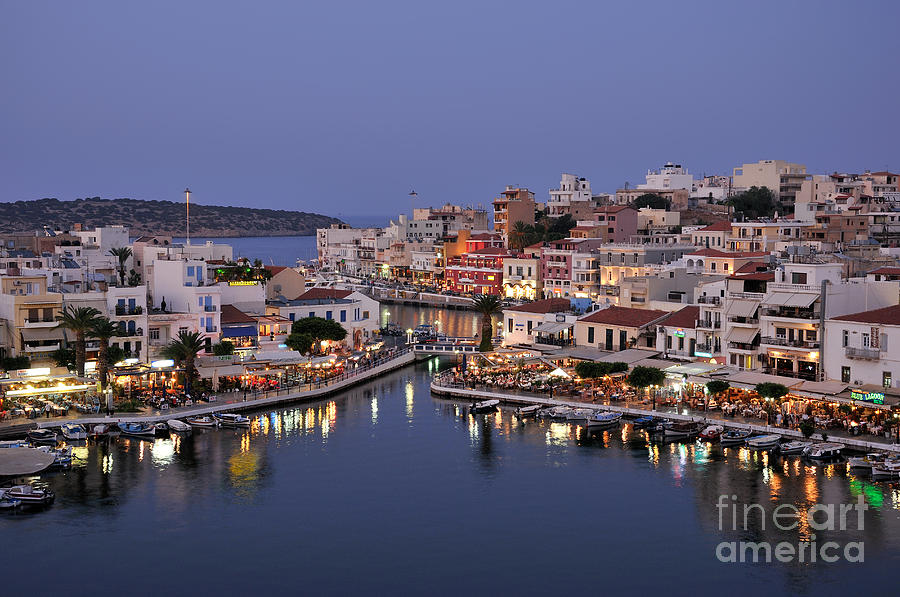 Shower Curtains Photograph - Agios Nikolaos city during dusk time by George Atsametakis