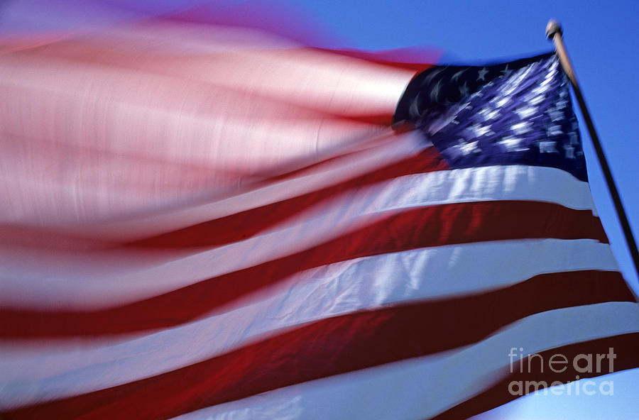 American Flag blurred waving in the wind  #2 Photograph by Jim Corwin