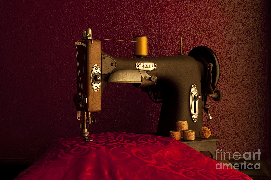 Antique sewing machine with spools and thread and fabric #2 Photograph by Jim Corwin