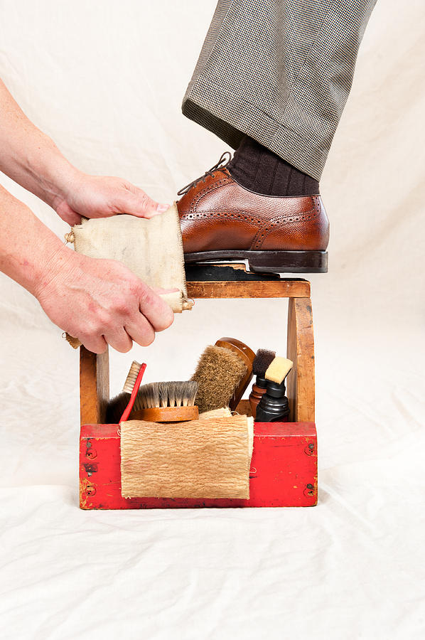 Antique shoe shine box and worker #2 Photograph by Joe Belanger