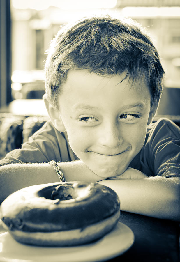 Cake Photograph - Boy with donut #2 by Tom Gowanlock
