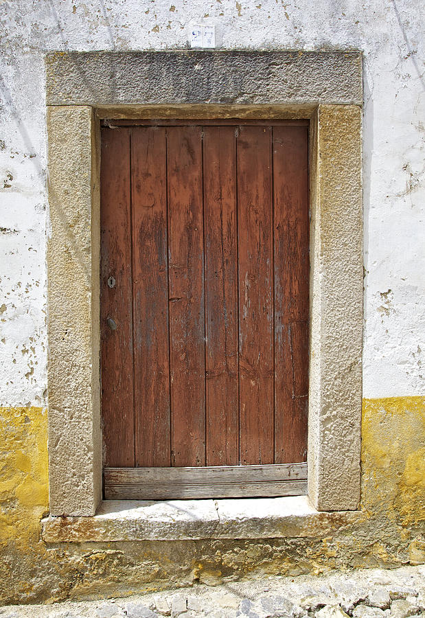 Brown Rustic Wood Door in a Medieval European Village Photograph by David Letts