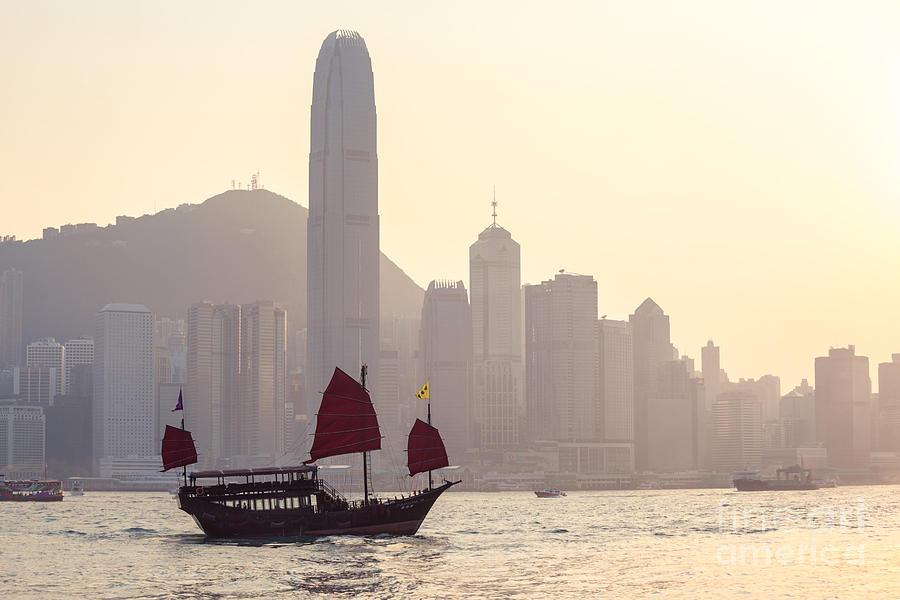Chinese junk boat sailing in Hong Kong harbor #2 Photograph by Matteo Colombo