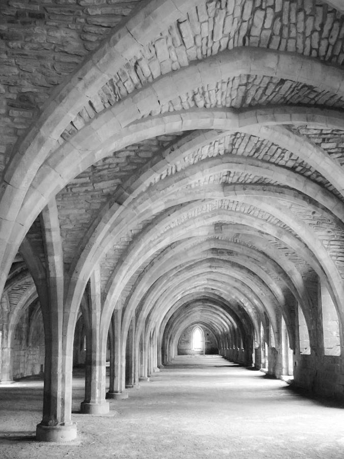 Church archways in black and white #2 Photograph by Sue Leonard