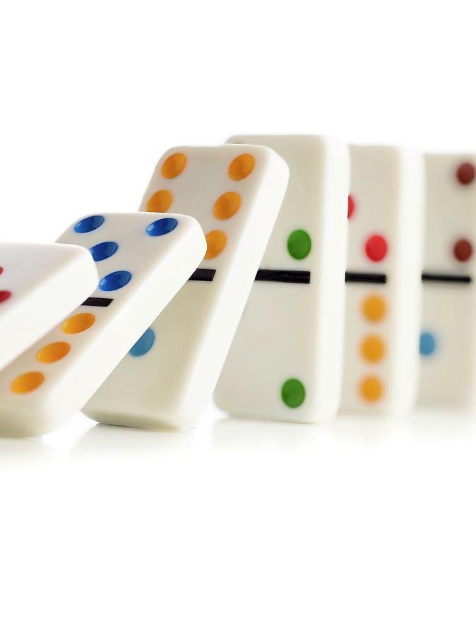 Colourful Dominoes Falling Down #2 Photograph by Science Photo Library