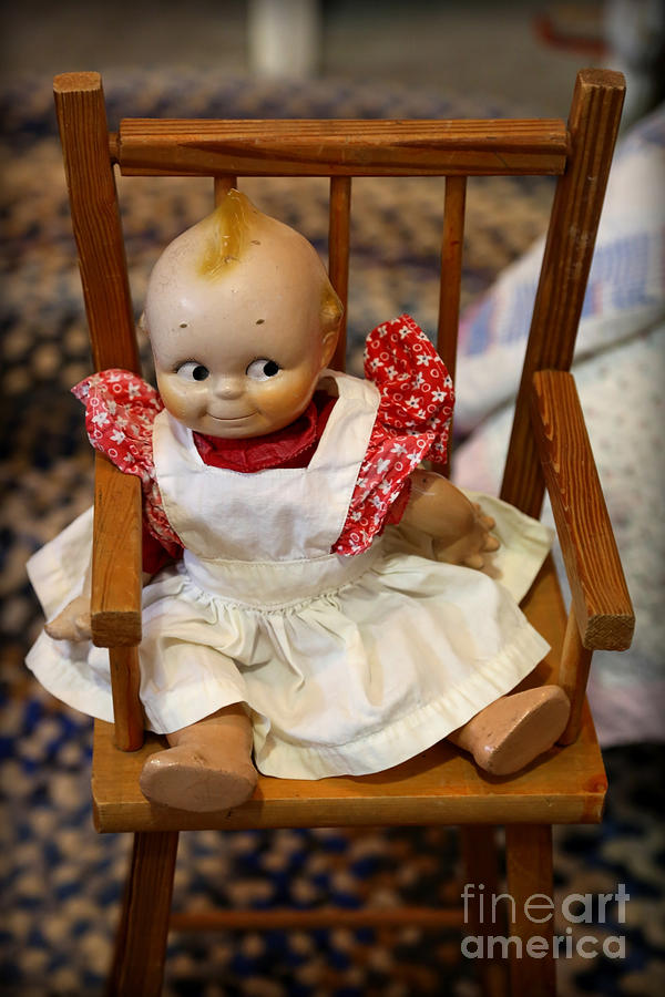 Kewpie Doll in Antique Chair Photograph by Carol Groenen