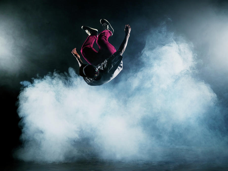 Dancer Leaping Through Smoke #2 Photograph by Henrik Sorensen