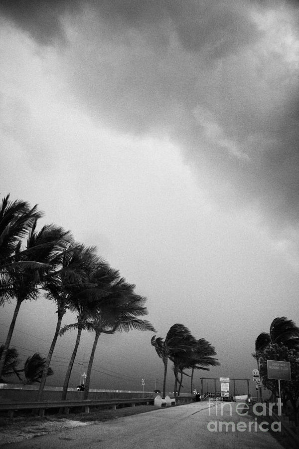 Key Photograph - Dark Rain Storm Clouds Blow Over The Seven-mile Bridge Marathon Key Florida Keys Usa #2 by Joe Fox