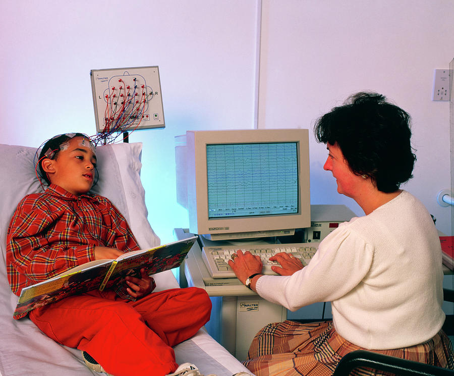Doctor Monitors Boys Brain Activity By Eeg #2 Photograph by Science Photo Library