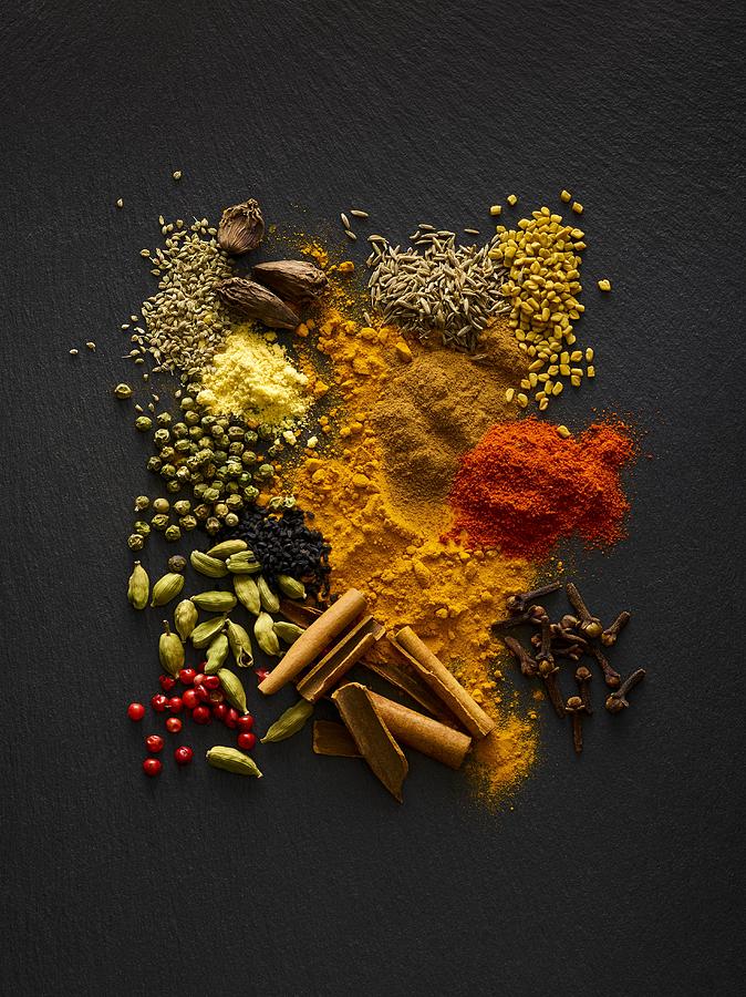 Dried spices on black slate #2 Photograph by Science Photo Library