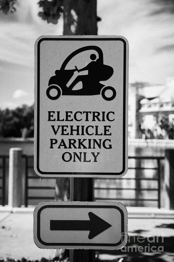 Car Photograph - Electric Vehicle Parking Only Spaces Bays In Downtown Celebration Florida Usa #2 by Joe Fox