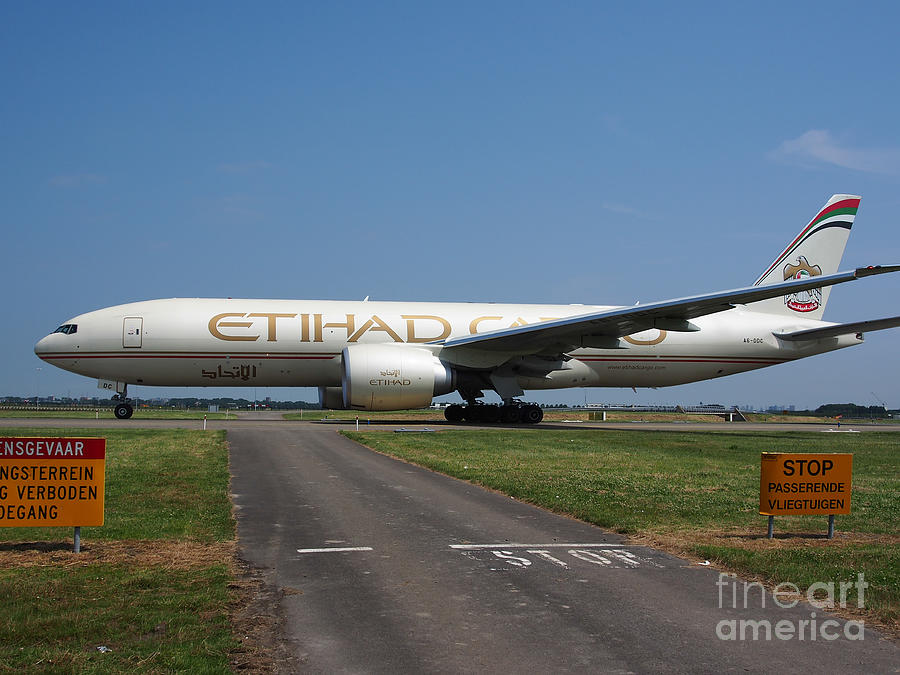 Transportation Photograph - Etihad Airways Boeing 777 #2 by Paul Fearn