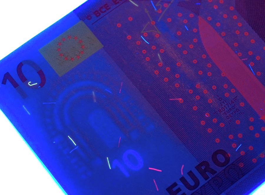 Euro Photograph - Euro Banknote In Uv Light #2 by Louise Murray/science Photo Library